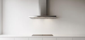 En fotorealistisk bild av en minimalistisk köksfläkt i rostfritt stål, integrerad i ett rent, modernt kök.