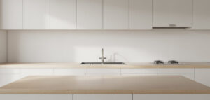 Fotorealistisk bild av minimalistiskt vitt kök med träbänk och stålvask.