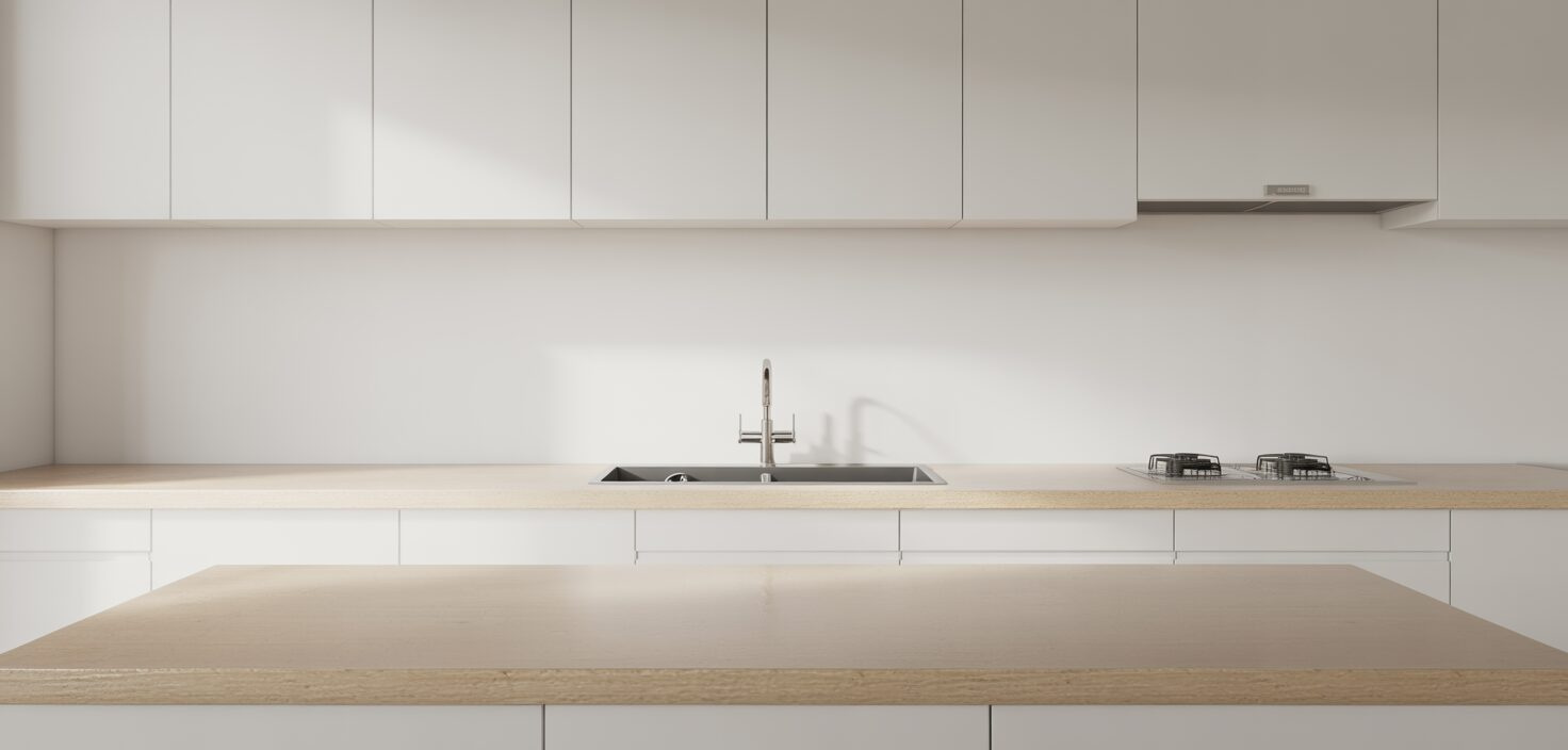 Fotorealistisk bild av minimalistiskt vitt kök med träbänk och stålvask.