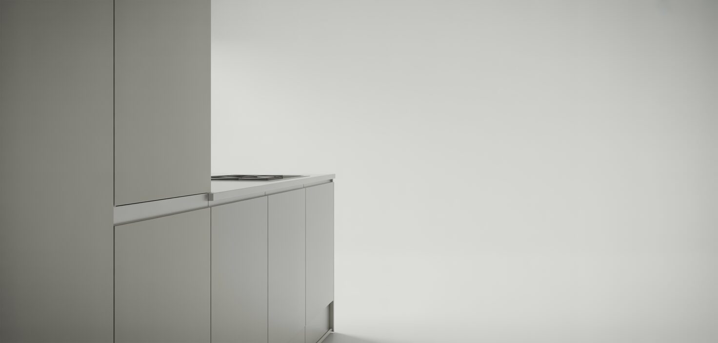 Minimalistiskt vitt kök med vit skåpsdörr